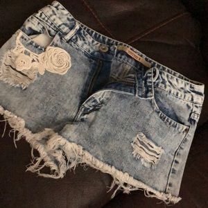 High waisted distressed shorts